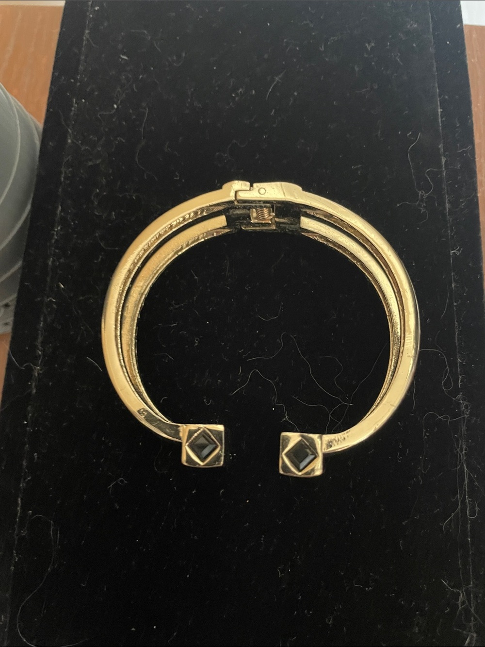 Gold Tone Open Cuff Bracelet with Black Accent